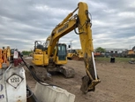 Back of Used Excavator for Sale,Front of Used Excavator for Sale,Used Excavator under darkened sky